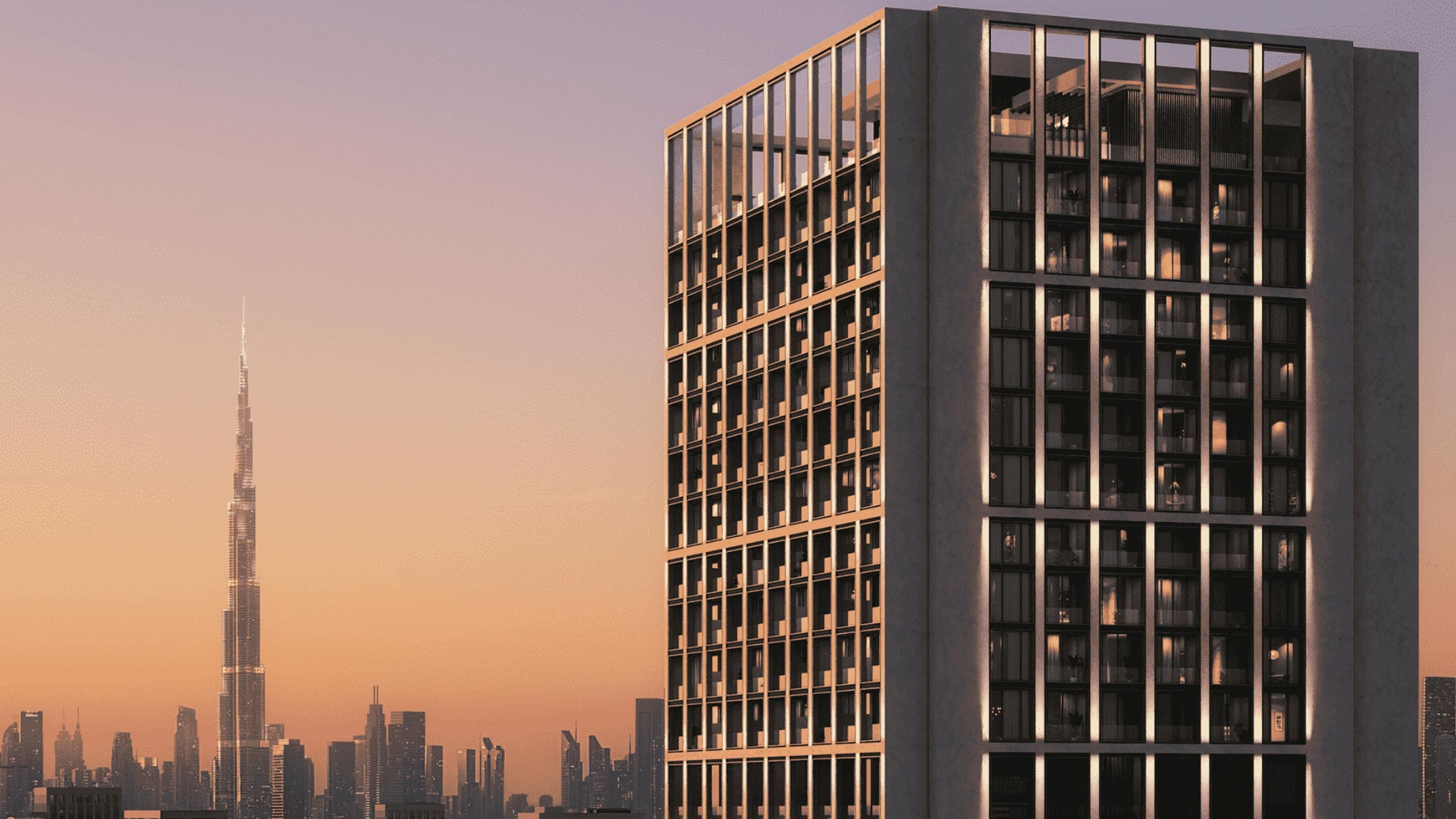 Sunset light reflecting off sleek high-rise with skyline views
