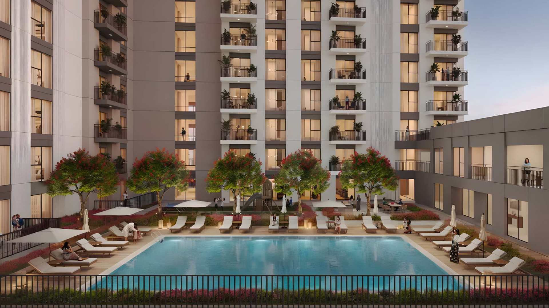Central pool deck surrounded by loungers and Camden apartments