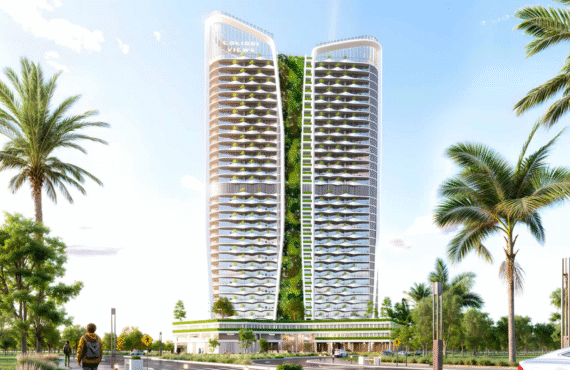 Colibri Views tower illuminated against the evening skyline