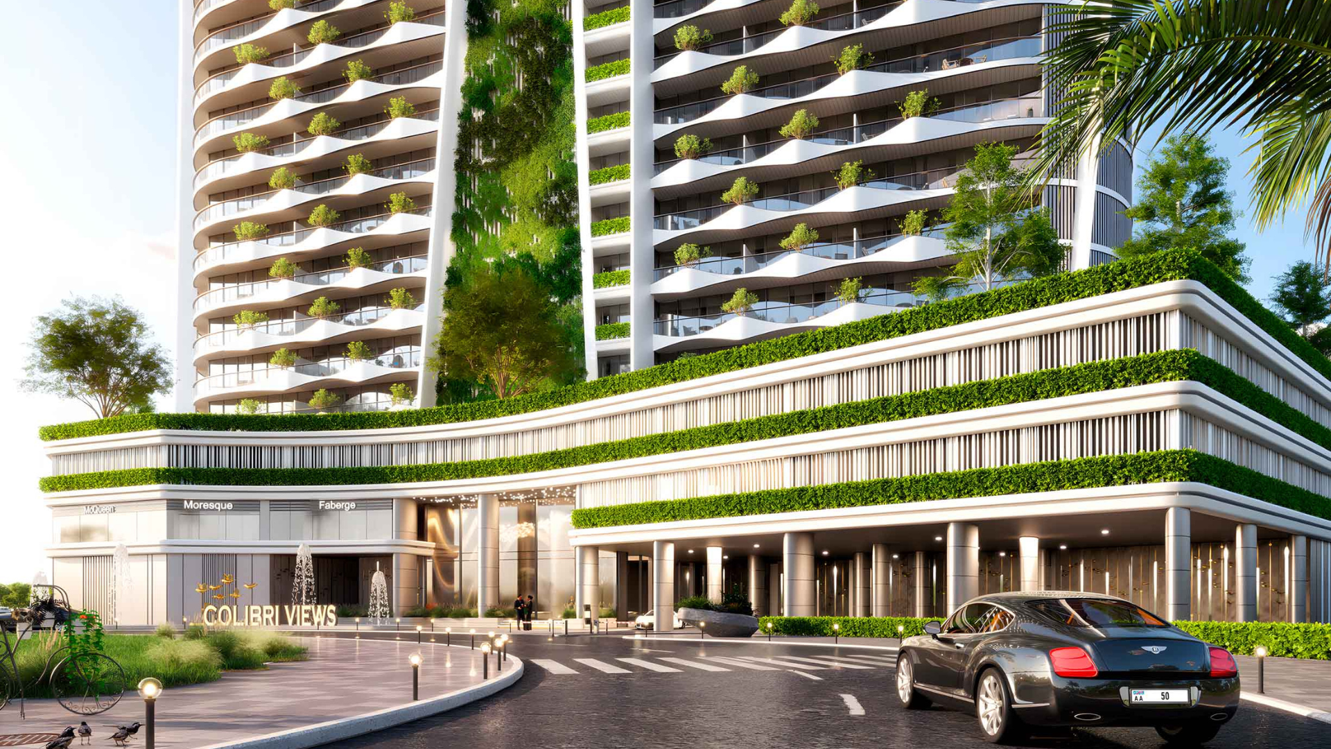 Illuminated residential high-rise against the serene coastline