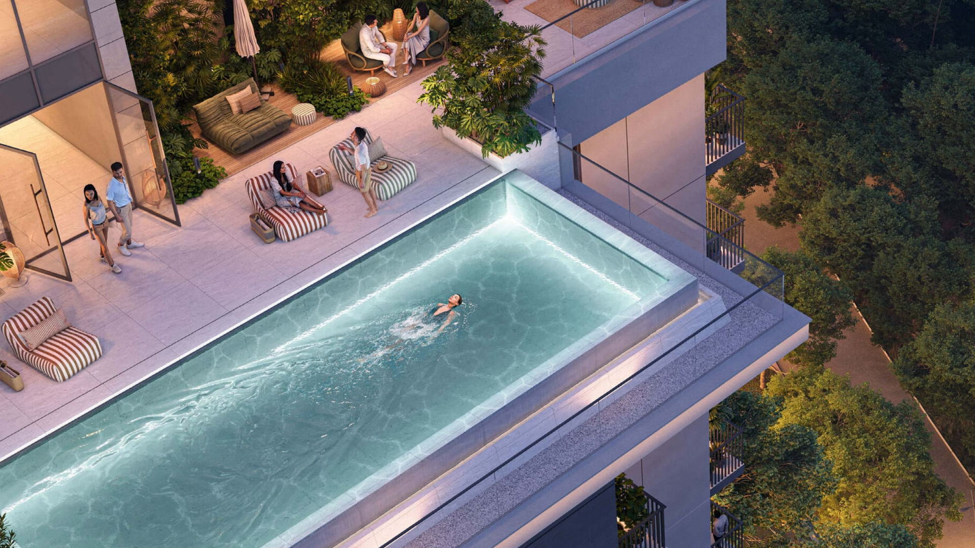 High-rise residential tower with curved glass facade, pool, and children's play area