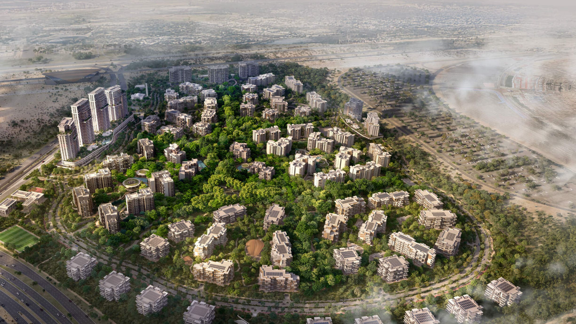 Modern architectural structure with curved glass facade, pool, and children's playground at Ghaf Woods