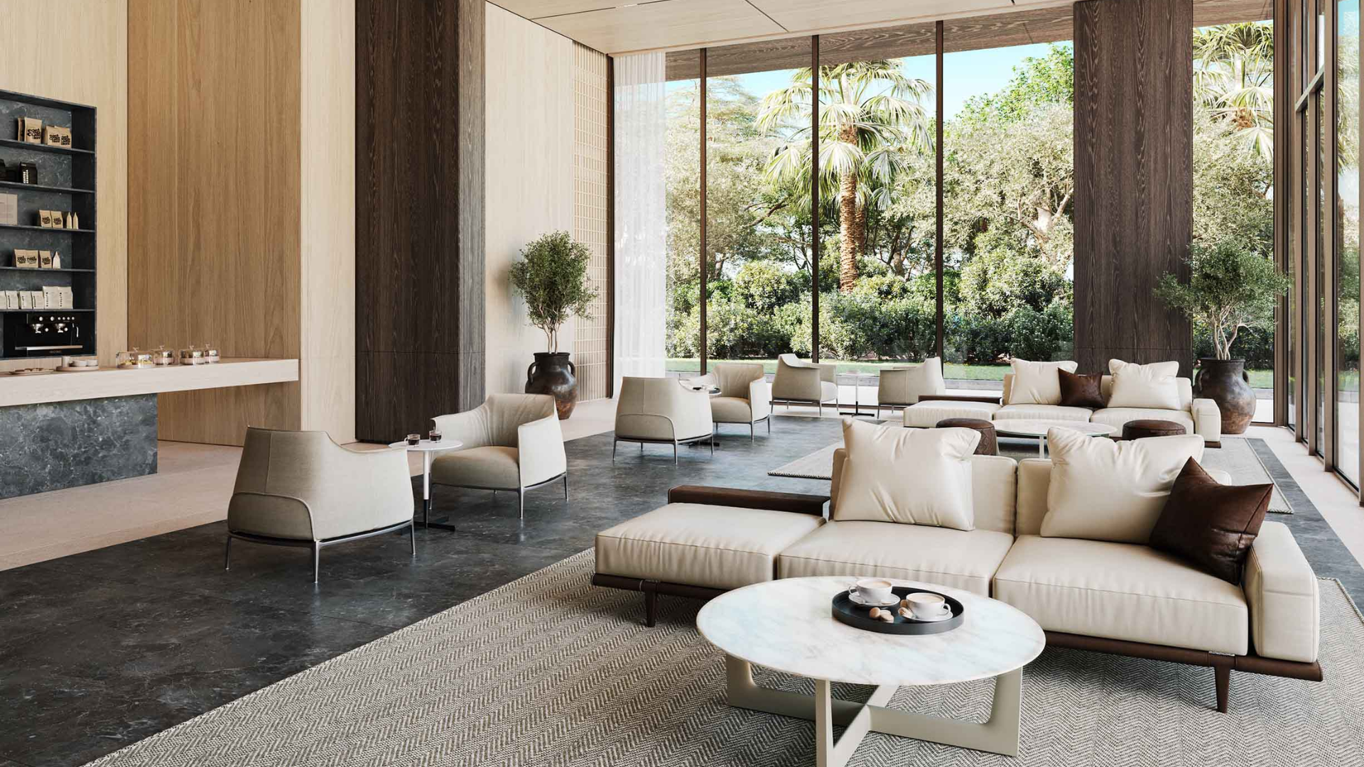 Elegant lobby with floor-to-ceiling windows, cream sofas, marble coffee table, and greenery outside