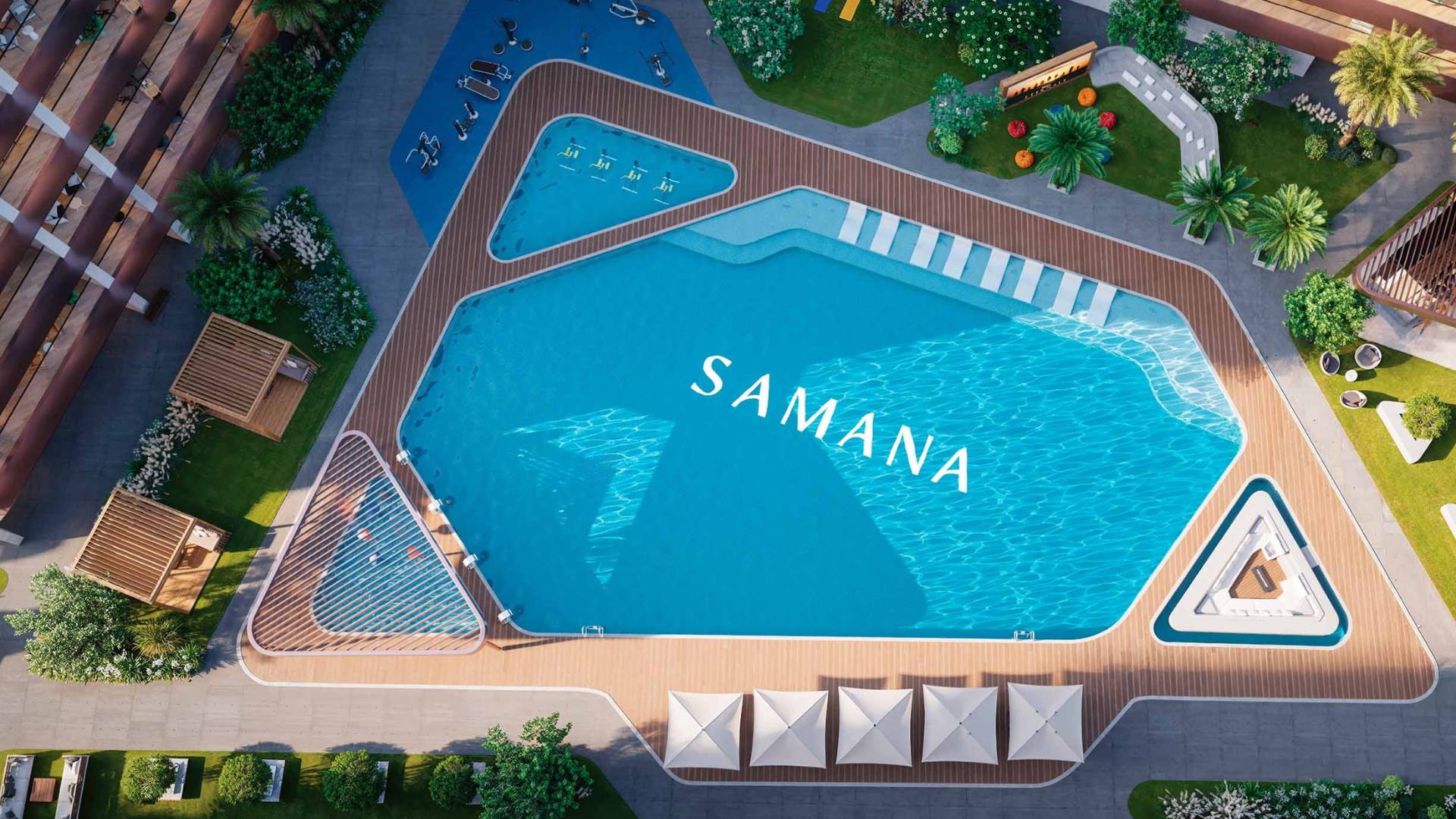 Resort-style swimming pool surrounded by sun loungers and landscaping