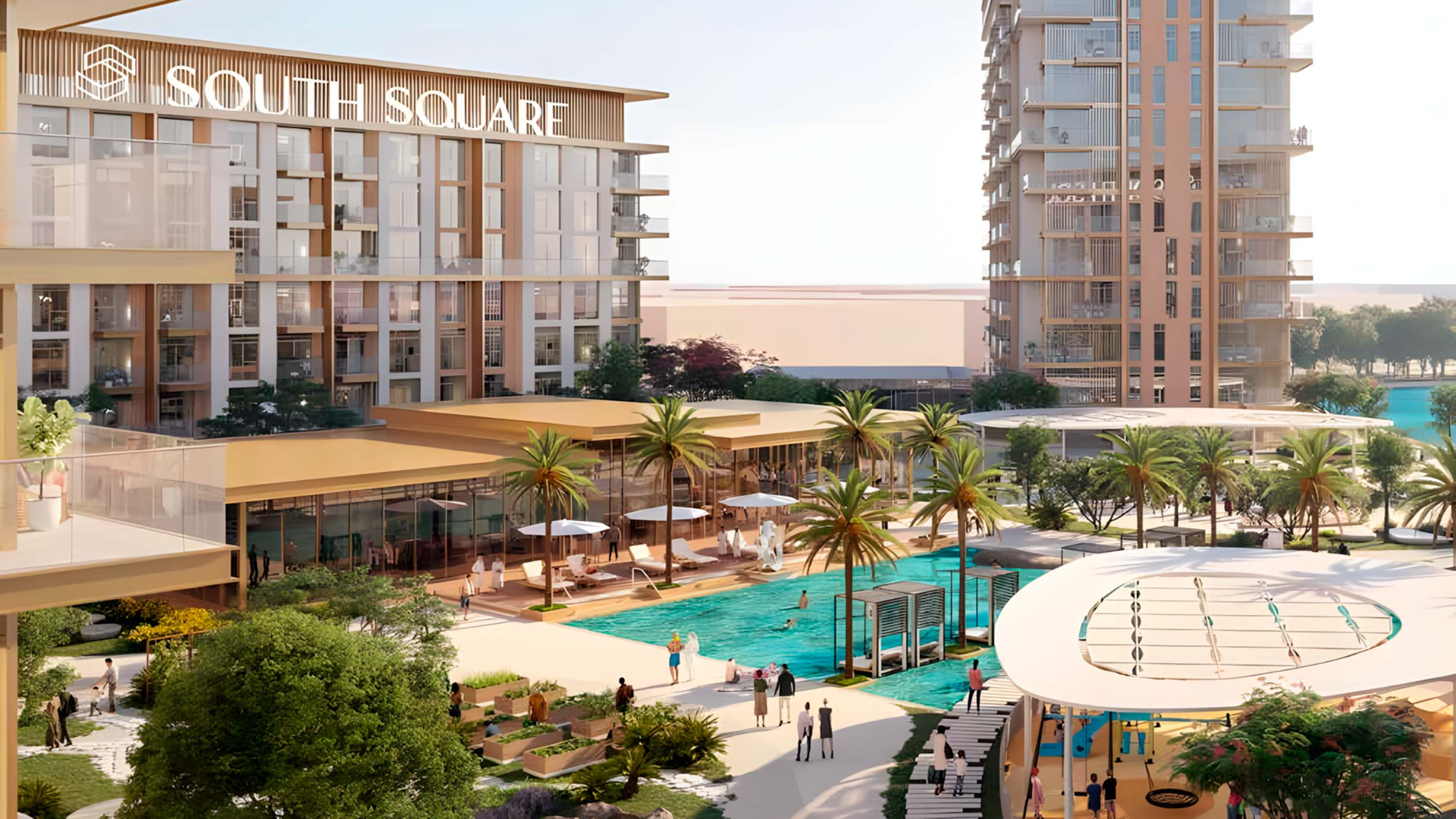 Modern residential complex beside lagoon with walking trails and greenery