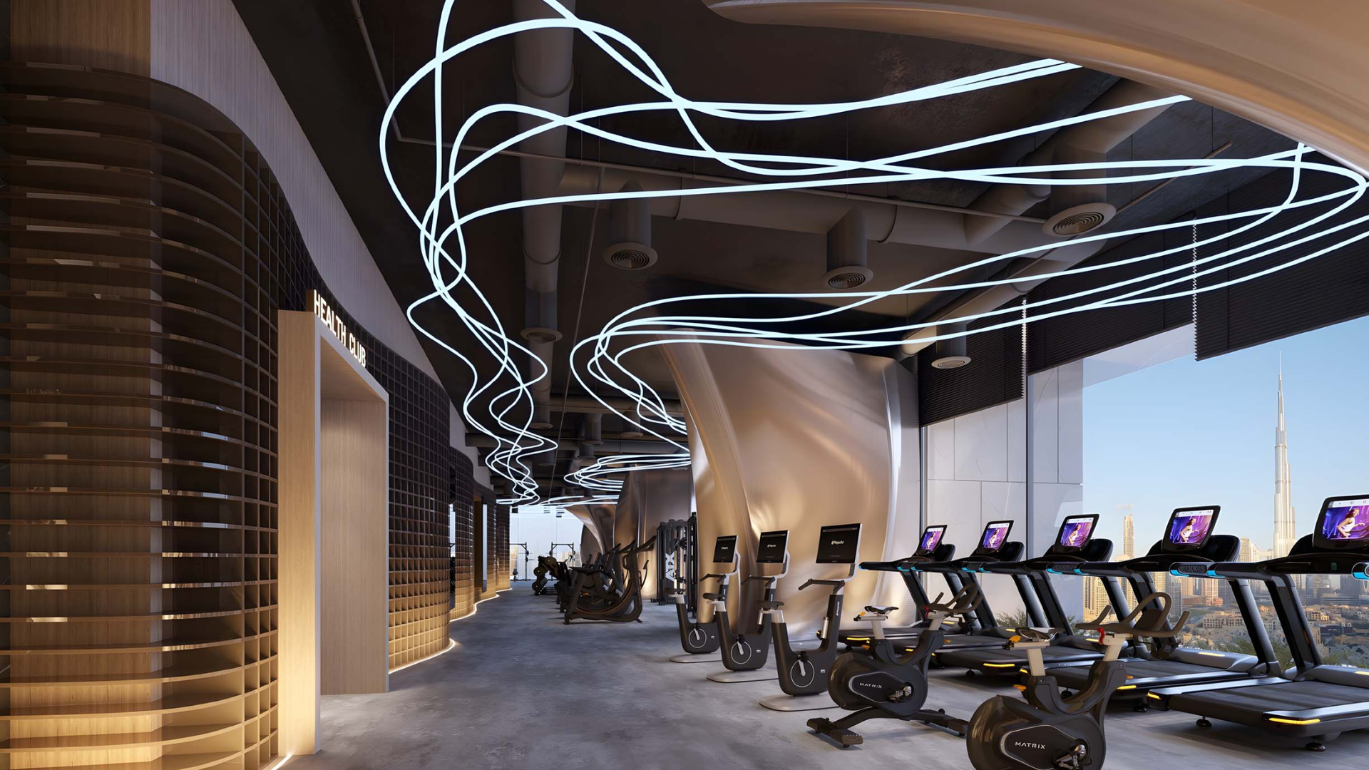 Modern fitness center with treadmills, exercise bikes, unique ceiling lights, and city views.