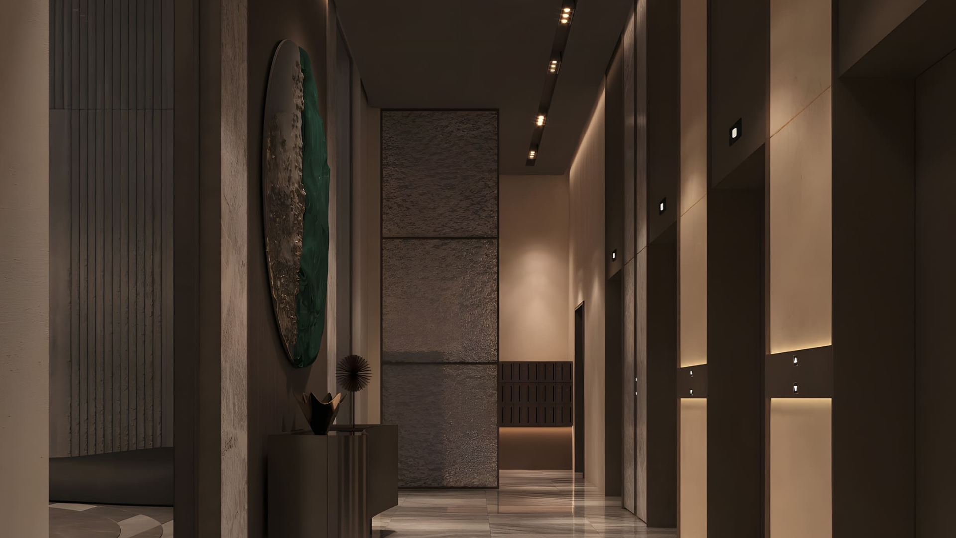 Stylish elevator lobby at V-SUITES by Anax with modern lighting and artistic decor