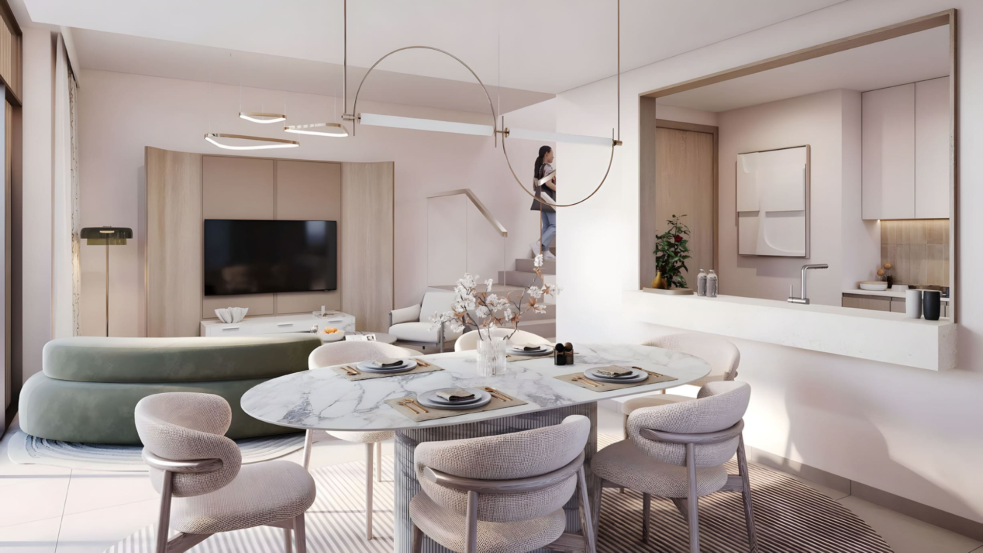 Elegant open-plan dining and living area with modern interiors and kitchen pass-through at WAADA