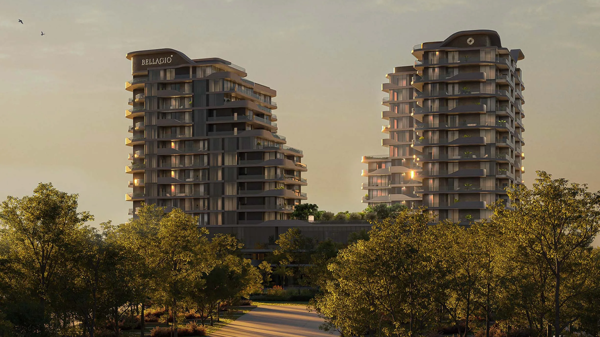 The large outdoor swimming pool area at Bellagio, complete with sun loungers, red umbrellas, and palm trees in front of its modern residential building.