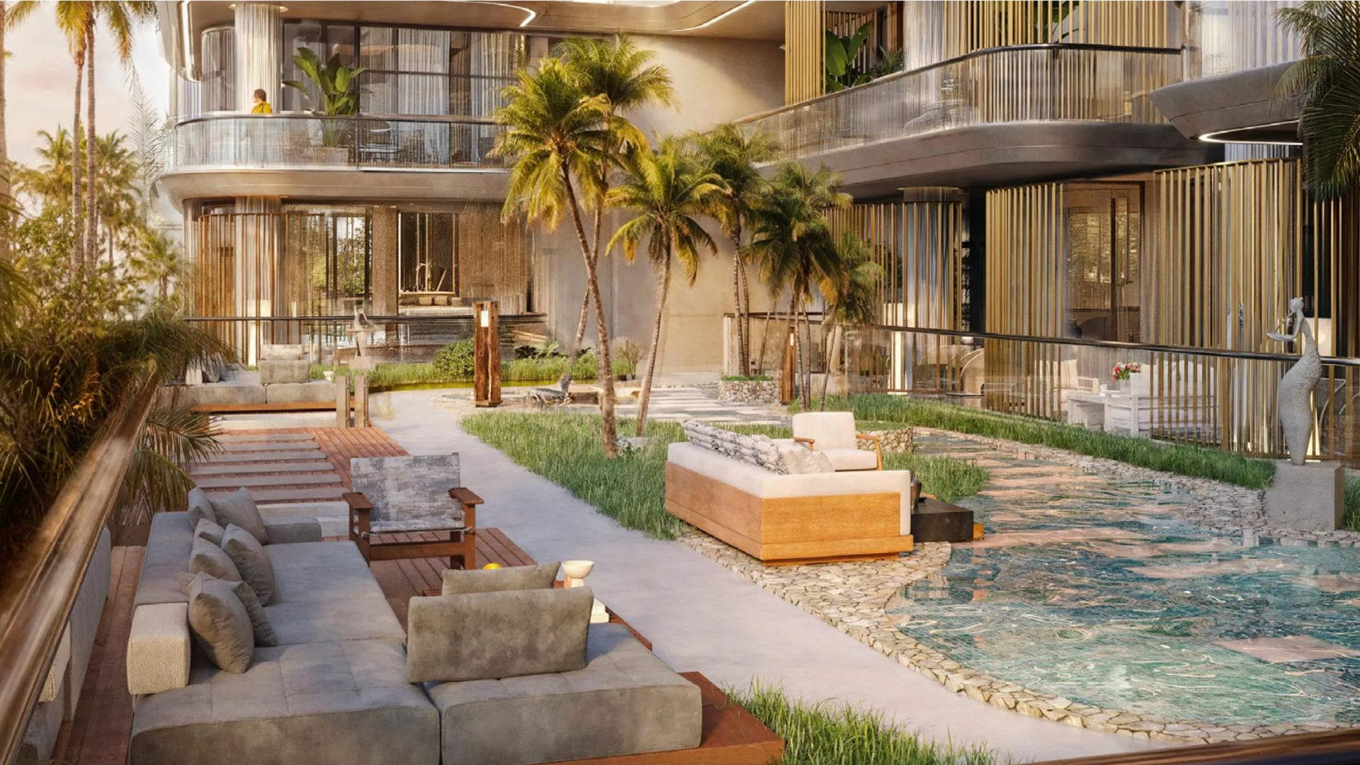 Outdoor lounge area with modern seating, palm trees, and decorative water feature in a residential courtyard