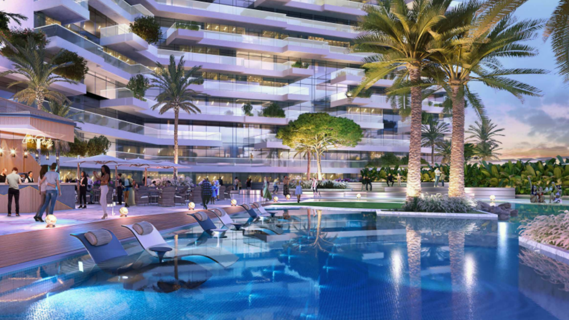 Infinity pool with sun loungers and landscaped surroundings at a modern residential complex