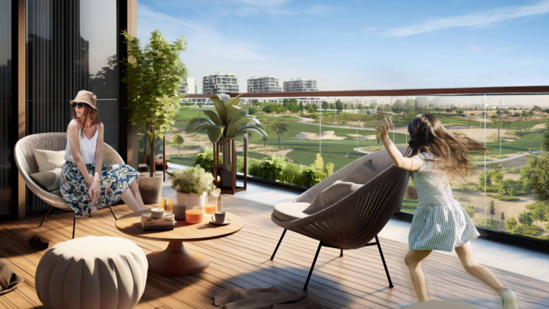 Woman relaxing on a balcony with scenic green landscape views while a child plays nearby