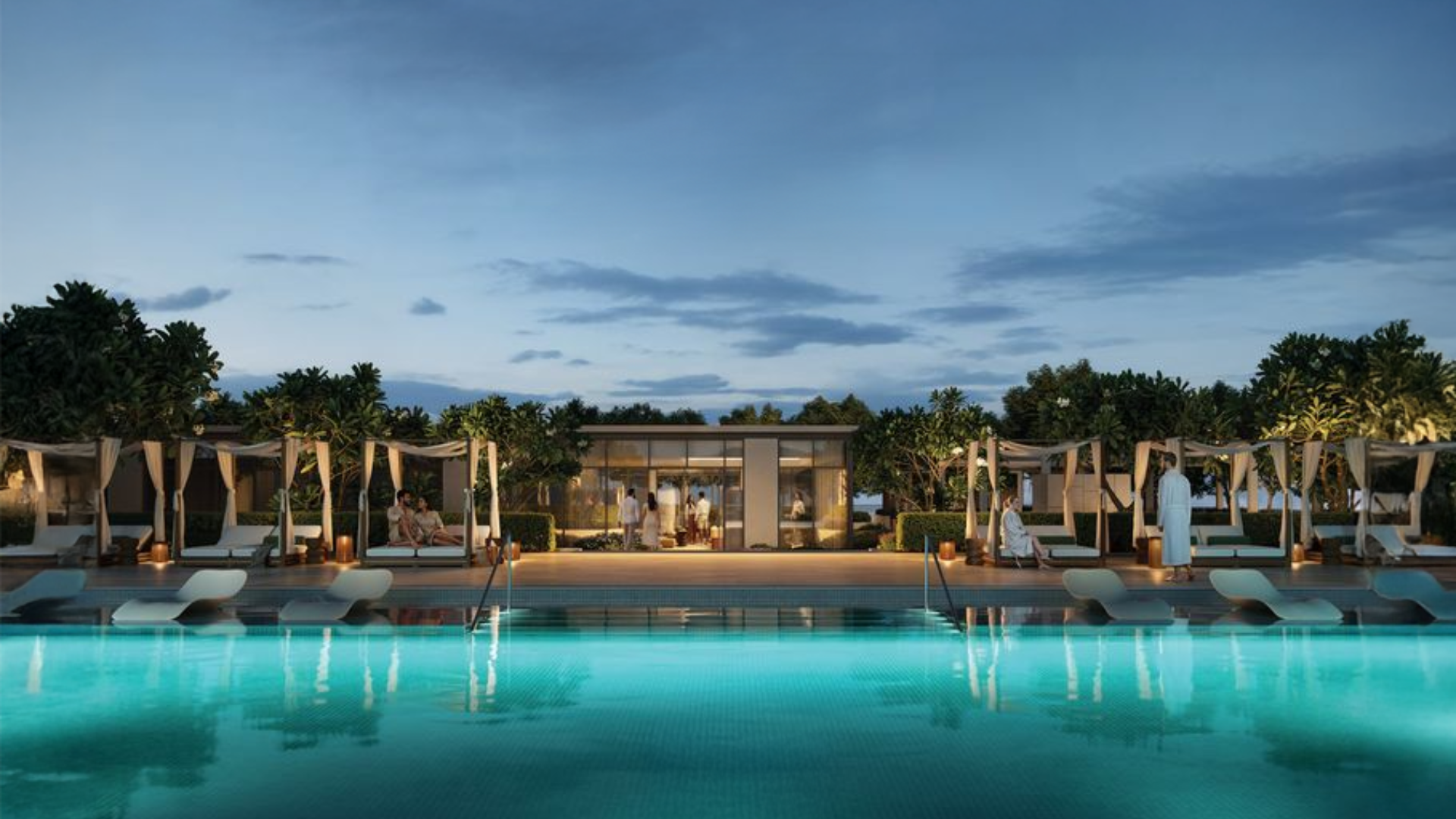 Evening view of the luxurious poolside lounge at Montiva by VIDA with cabanas and ambient lighting