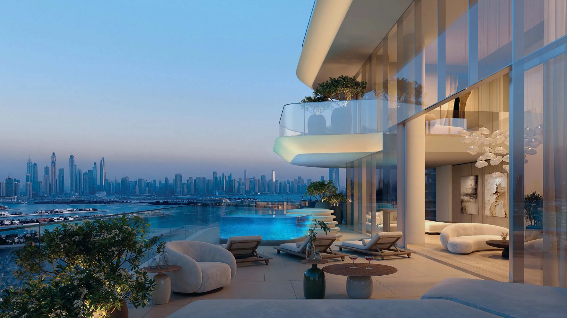 Terrace with private pool and city skyline views at sunset
