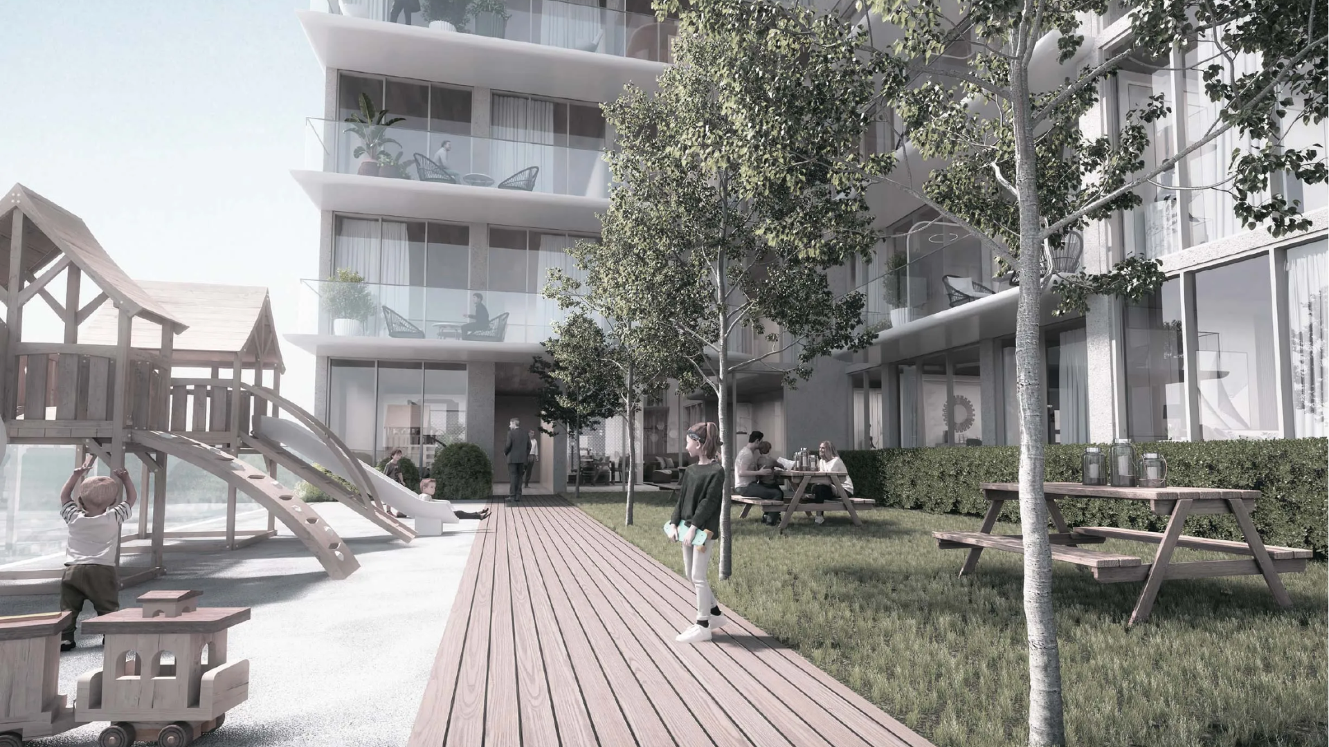 An aerial view of the lush, green Jumeirah Village Circle community, showing its parks, infrastructure, and easy access to local amenities.