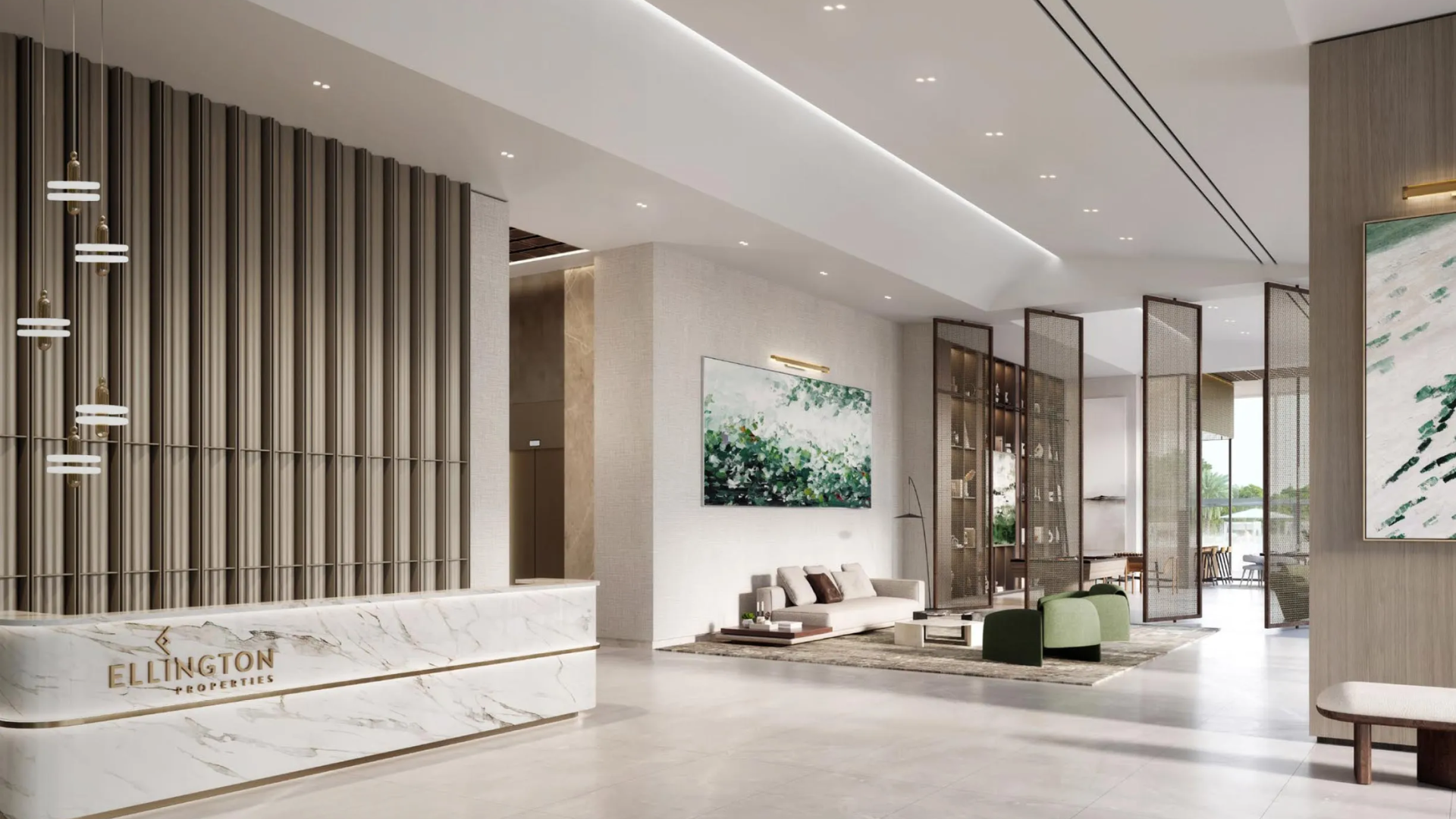 Modern luxury lobby at Ellington Properties with marble reception and stylish seating .