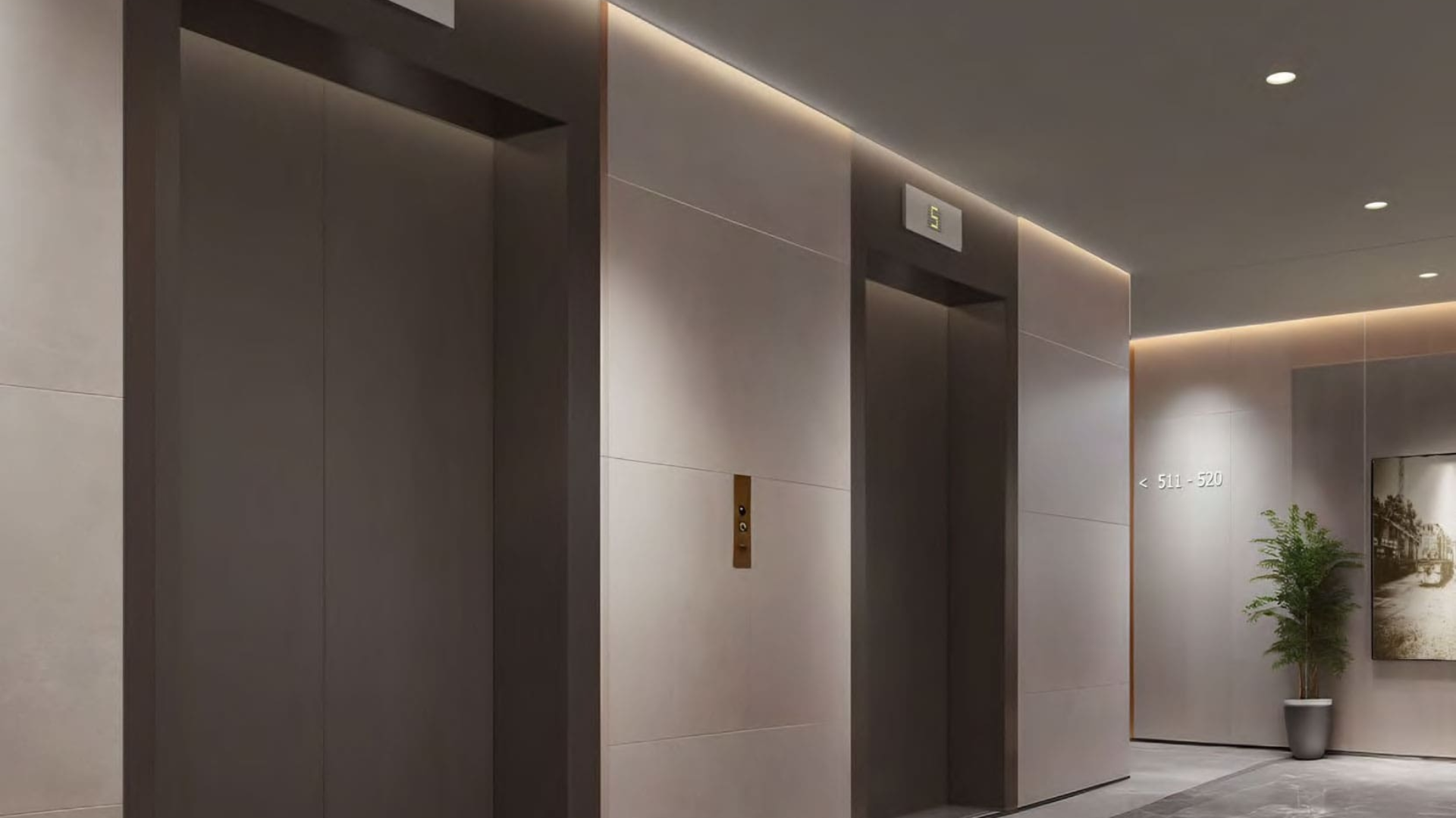 Residential building lobby featuring multiple elevators and a clean, minimalist design.