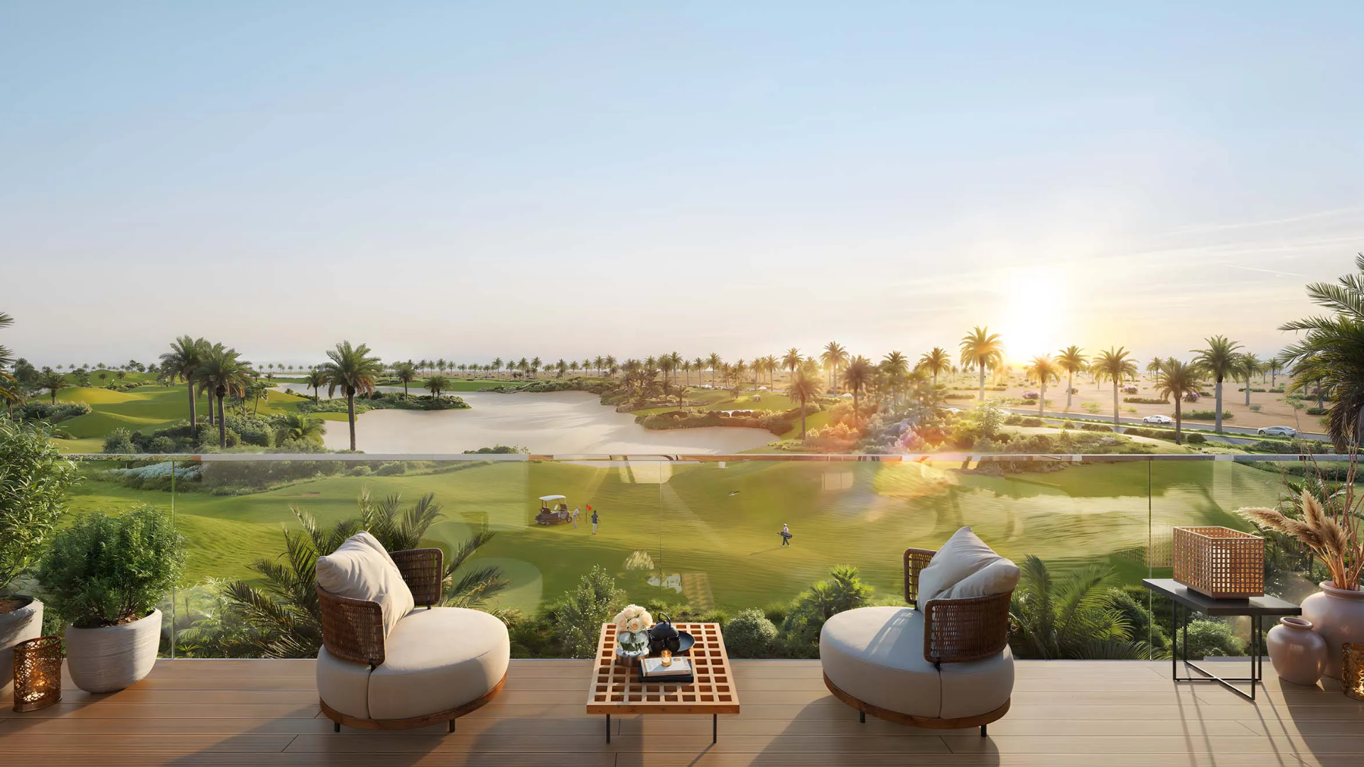 Balcony view overlooking golf course and lake with sunrise scenery