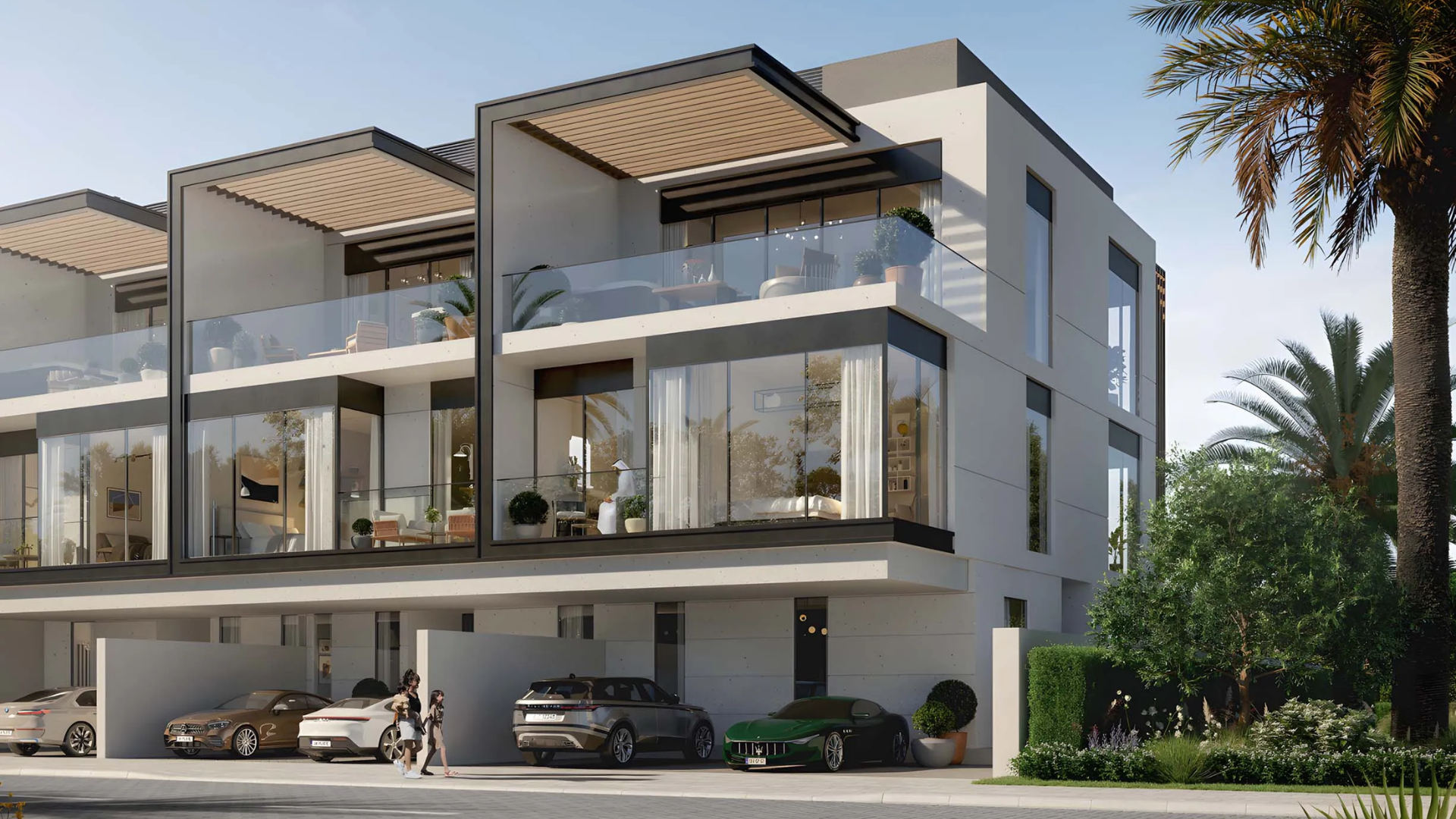Modern townhouse exterior at Terra Golf Collection Phase 2 with glass balconies and parking