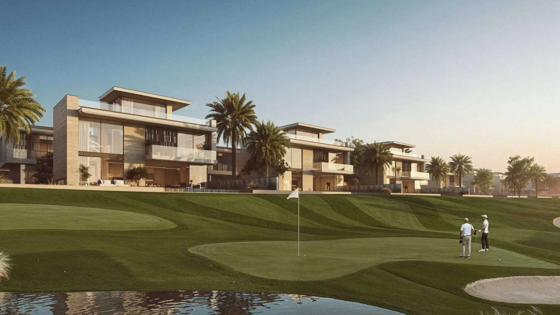 Luxury homes overlooking a manicured golf course and water feature .