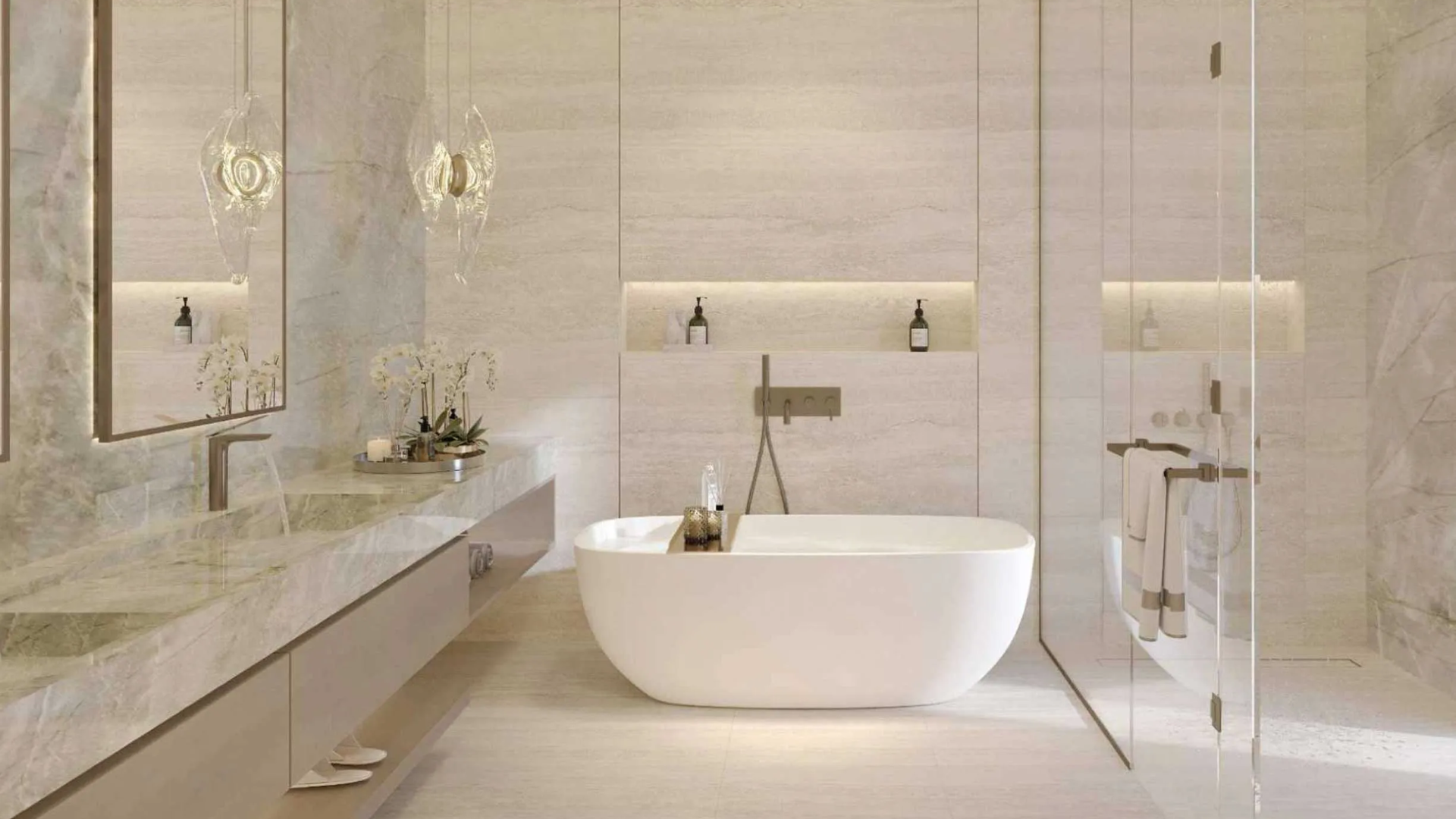 Modern master bathroom featuring soft lighting, neutral tones, and elegant double sinks.
