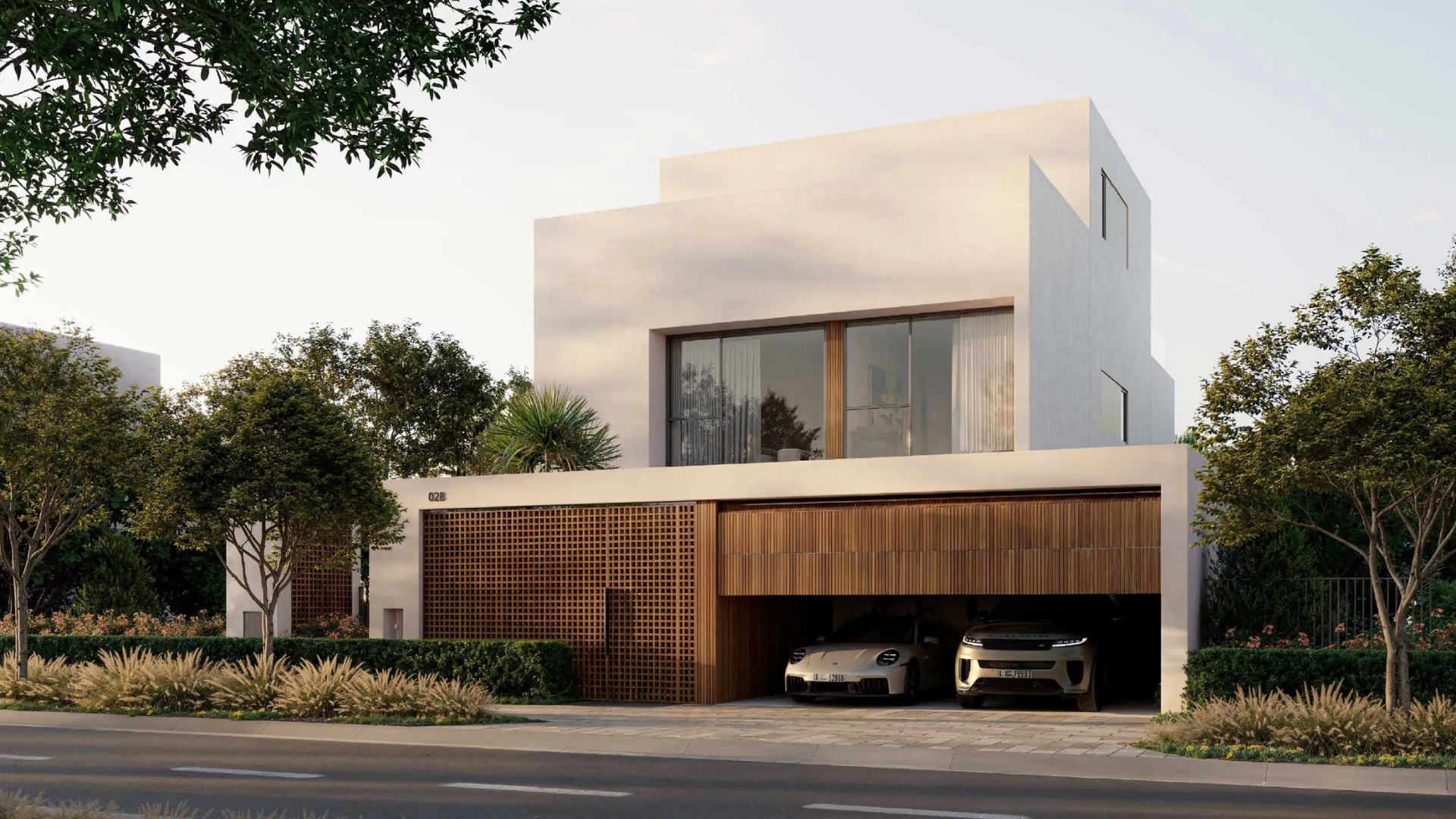 A contemporary villa in Dubai Investment Park 2 with large glass doors opening to a private garden and pool.