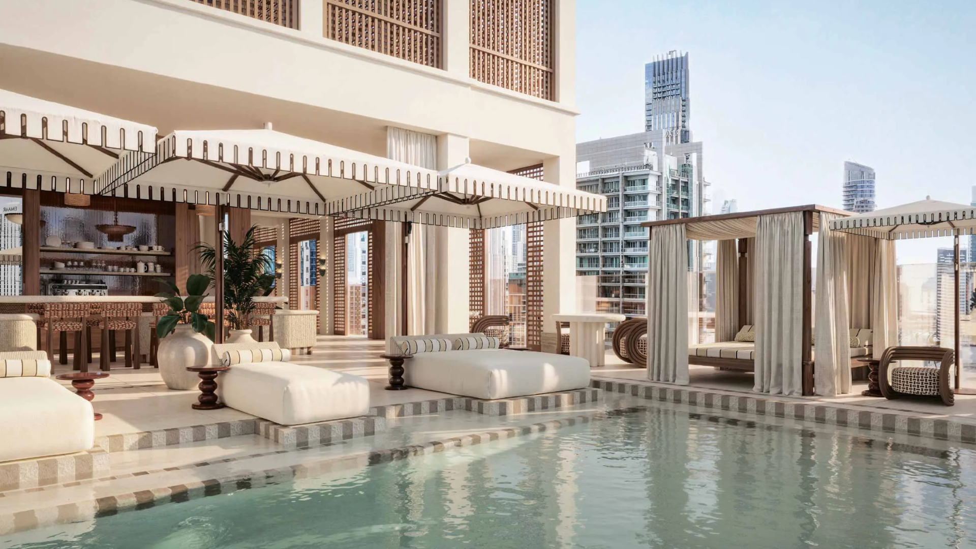 Infinity pool with panoramic views of the Dubai skyline at Elire Residences
