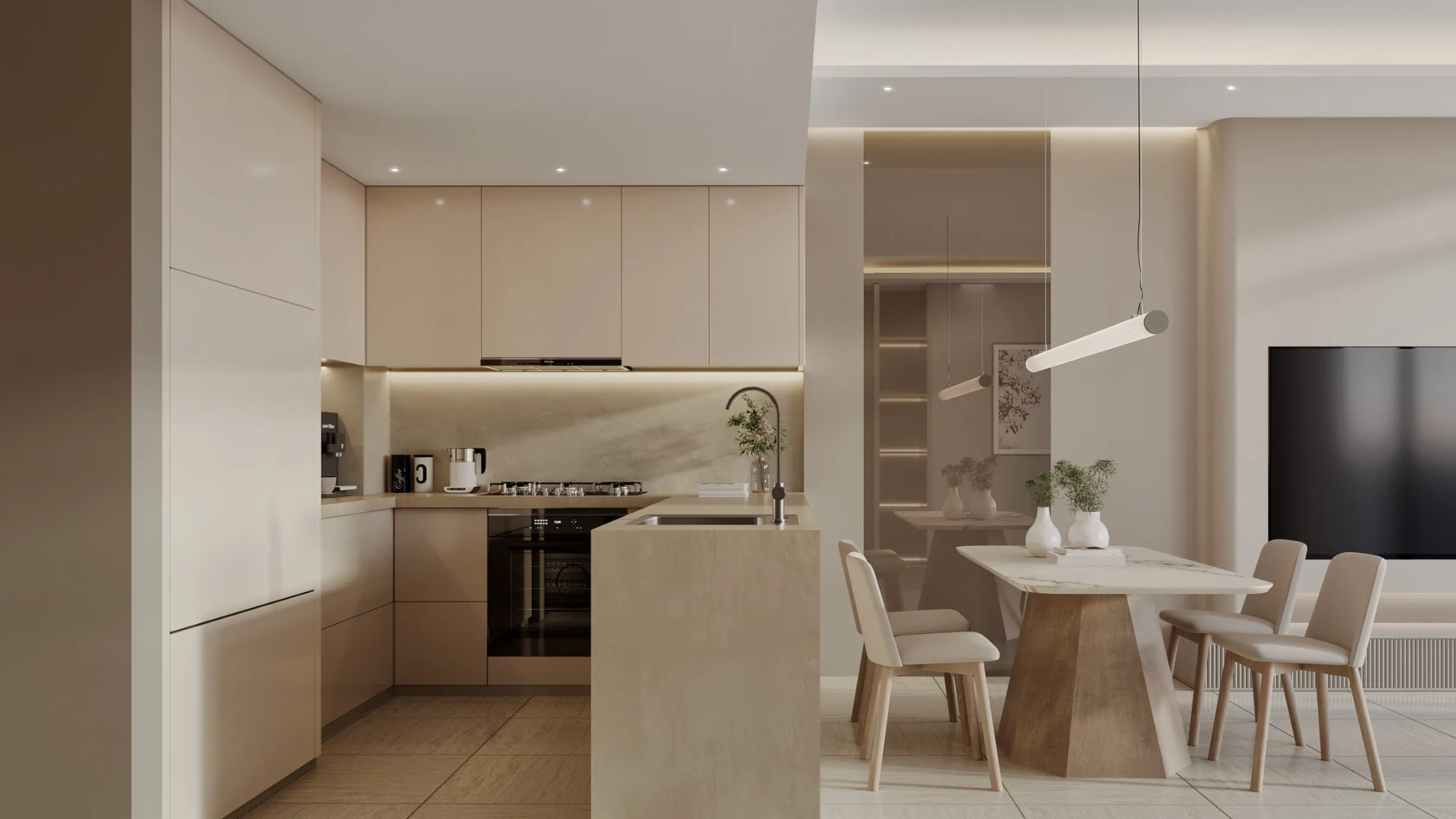 Modern kitchen with beige, handleless cabinets, built-in appliances, and a seamless dining area.
