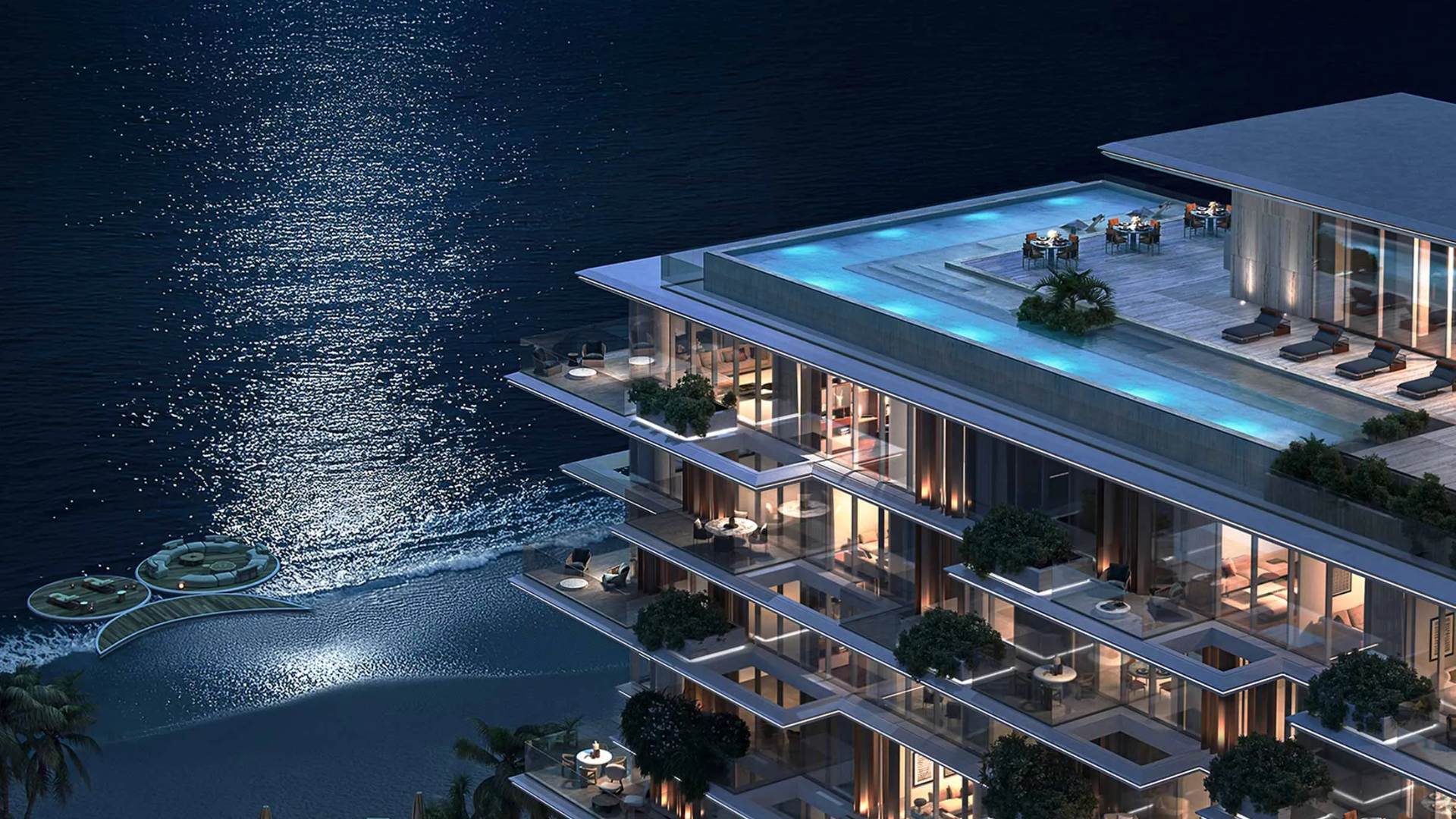 Modern multi-story residences with spacious balconies overlooking the sea .