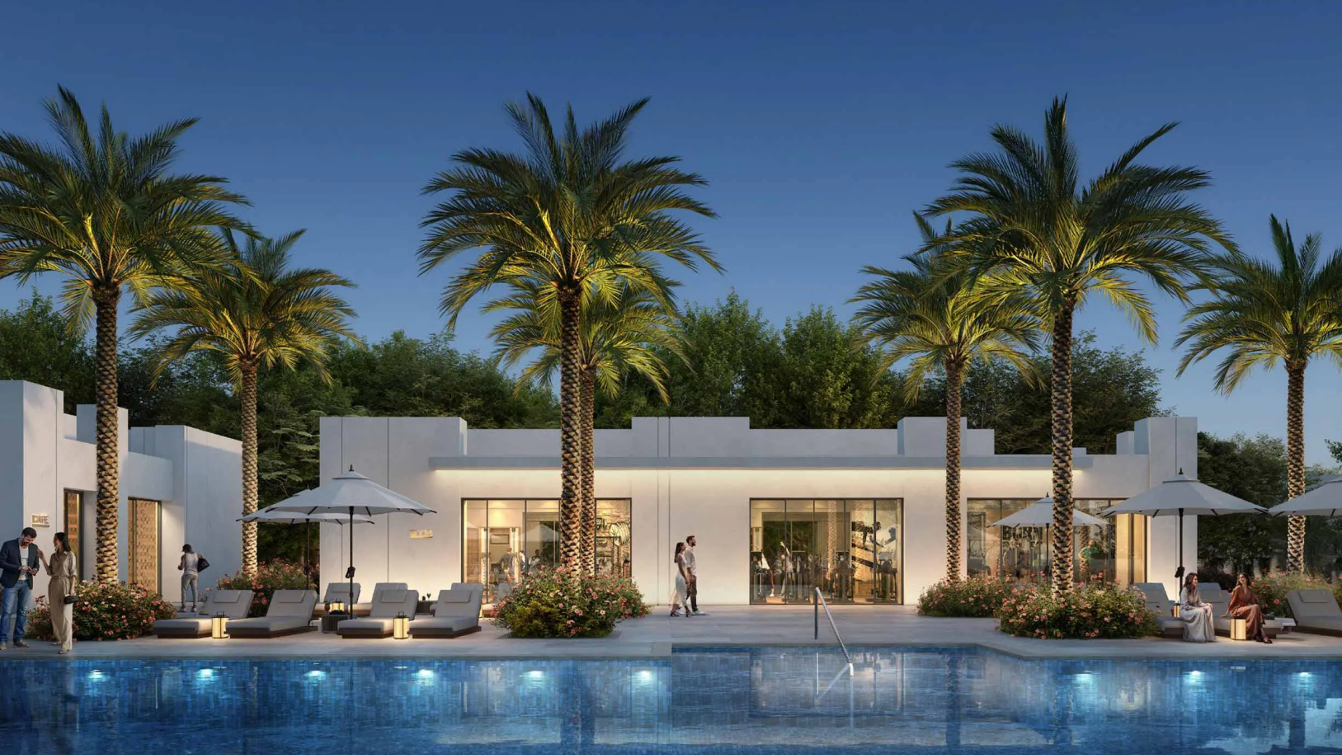 Resort-style community amenity building with a visible gym interior and an outdoor pool deck.