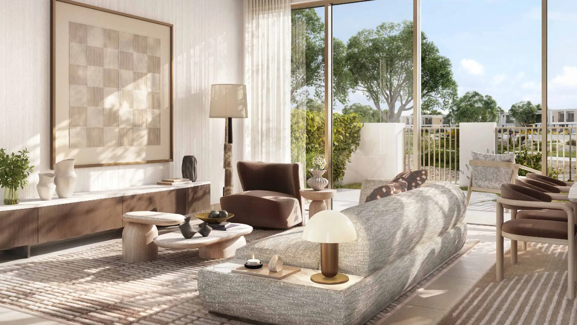 Modern living room with a neutral-toned sofa, contemporary furniture, and large windows opening to a private garden.