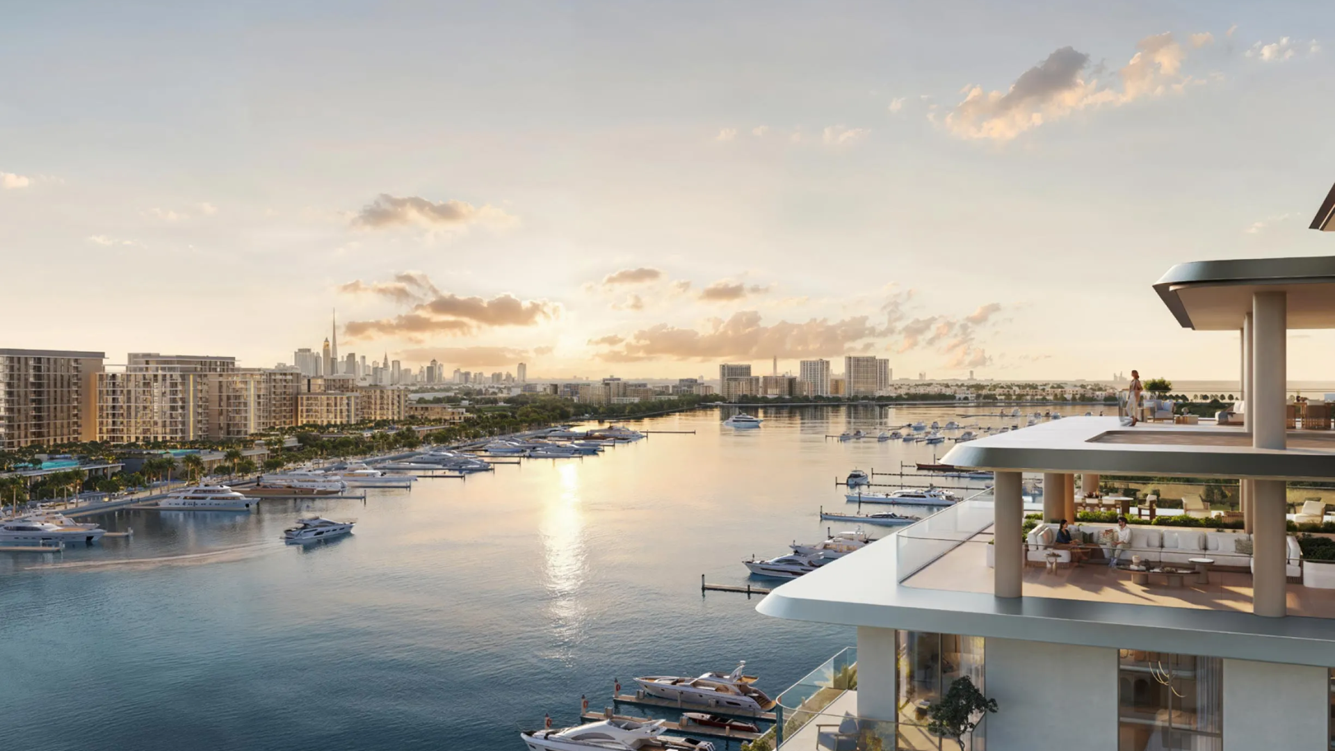Modern balcony overlooking a busy marina, with people enjoying an outdoor lounge area.