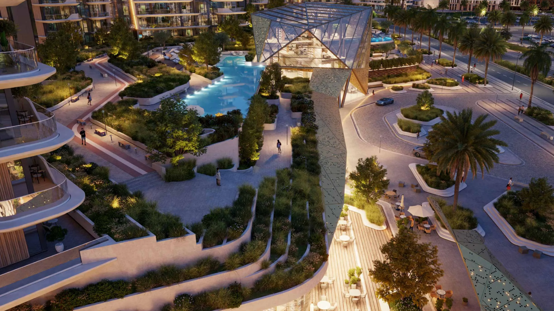 Lush, illuminated central park with walking paths, outdoor seating areas, and a distinctive clubhouse building at dusk.