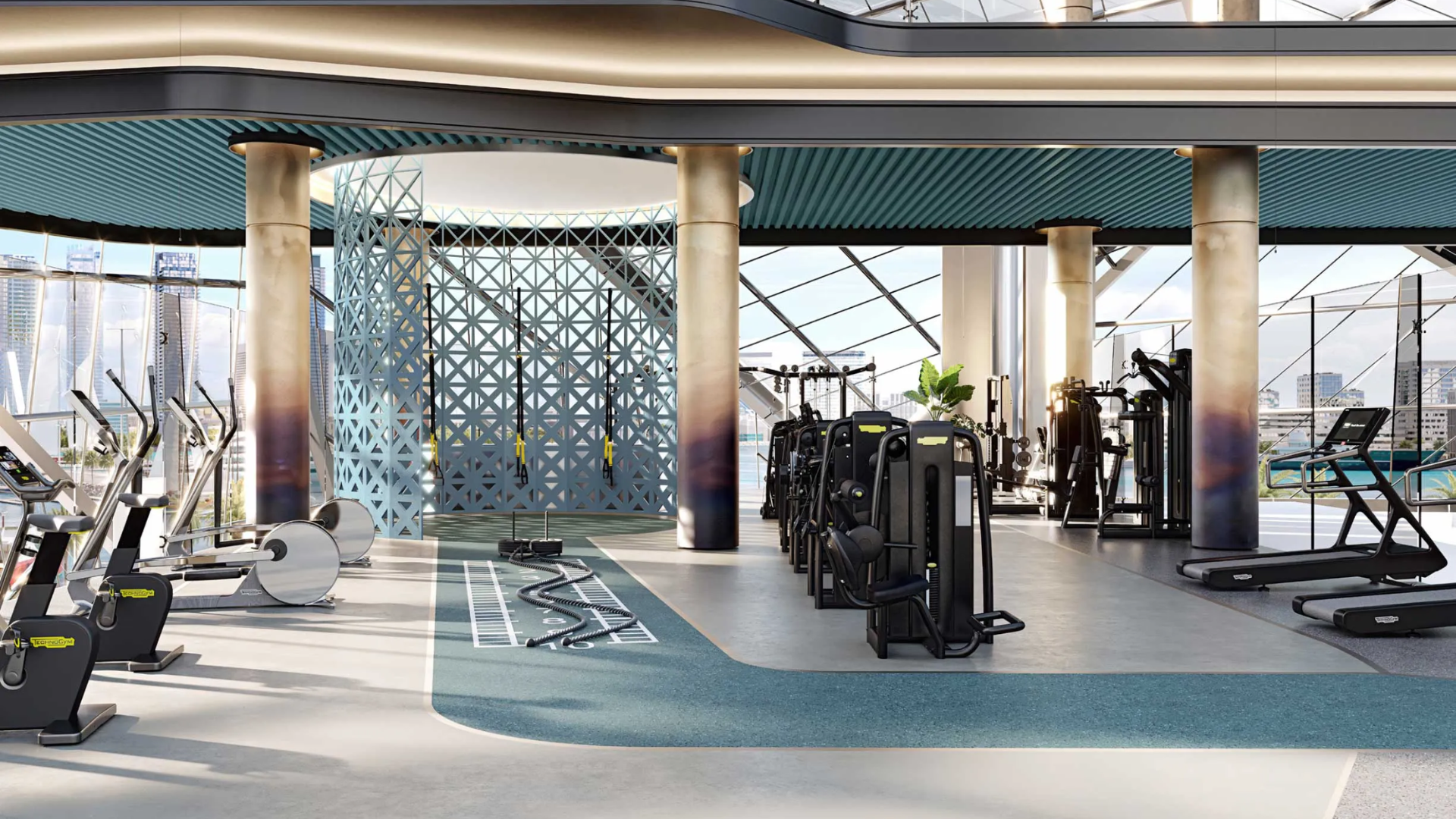 Residential gym interior with treadmills, ellipticals, and a bright, open design with large windows.