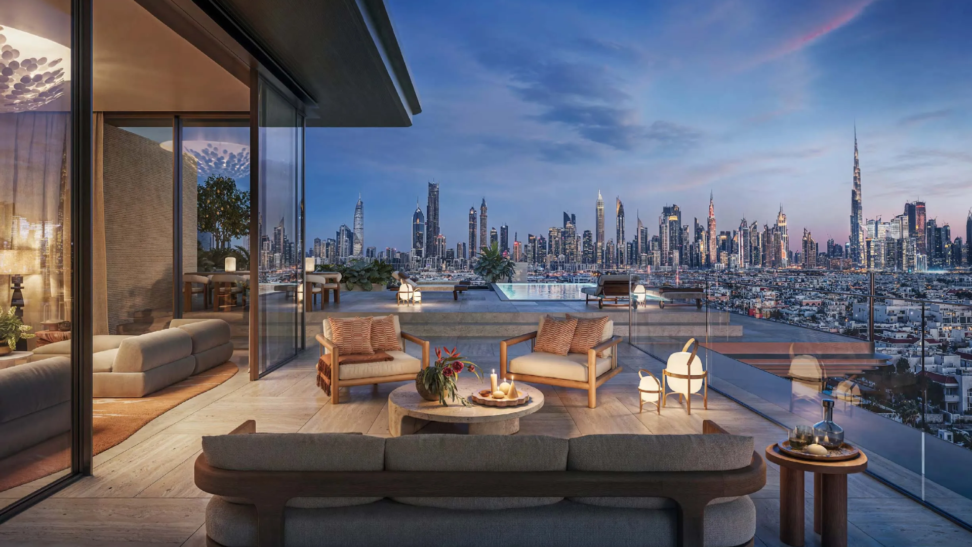 Outdoor lounge area at Solaya with comfortable seating and the Burj Khalifa and city view in the background.