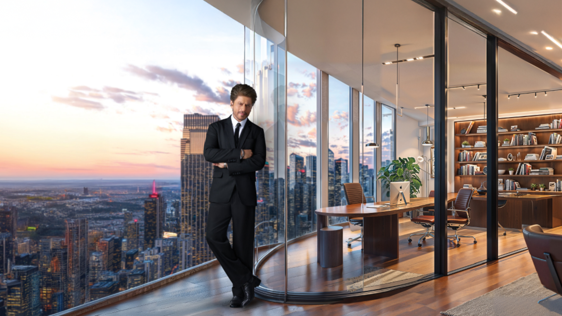 Luxury high-rise office interior featuring a curved balcony, wooden flooring, and a large custom desk.