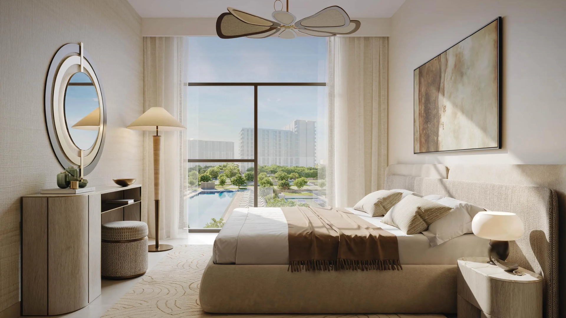 The elegant bedroom interior of a Terra Gardens home, with contemporary furniture and a view of the resort amenities.