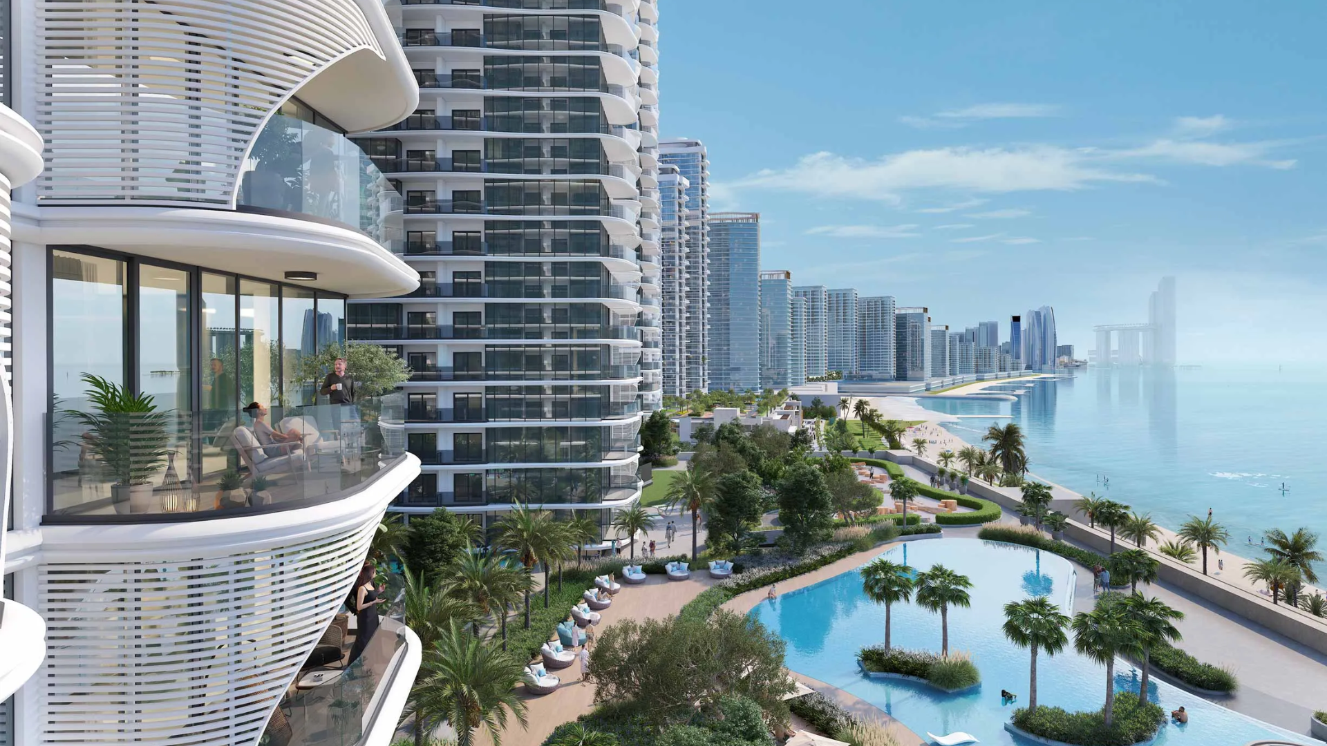 A group of modern high-rise apartment towers in Umm Al Quwain, featuring curved architectural facades.